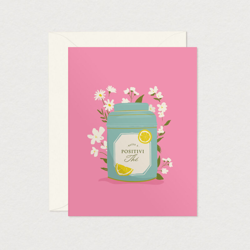 Carte de souhaits PositiviThé illustrée d’une boîte de thé décorative entourée de fleurs blanches et de tranches de citron
