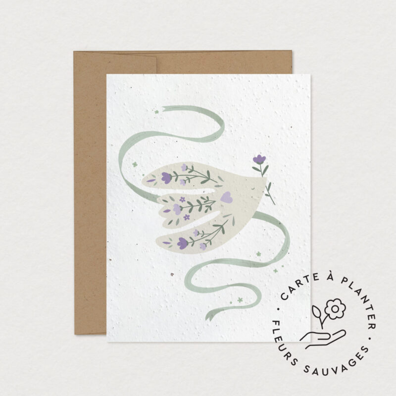 Carte à planter Envolée sur papier ensemencé illustrée d'une main ornée de fleurs sauvages et d'un ruban vert, création Mimosa Design.